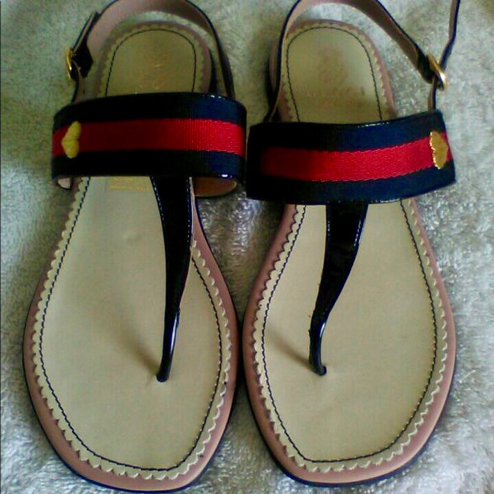 Gucci girls thong sandals.